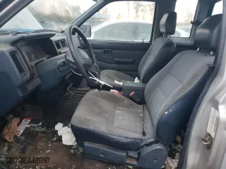 1993 Nissan Trucks 2WD with VIN 1N6SD16S9PC308706, listed as a Copart auction lot 77134644 with 141,834 mi miles and Salvage Title. Bid and sale history available at carsss.com. Image 7.