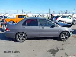 2005 Mitsubishi Lancer ES with VIN JA3AJ26E25U017526, listed as a IAAI auction lot 41680488 with 166,175 mi miles. Bid and sale history available at carsss.com. Image 14.