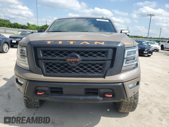 2021 Nissan Titan Pro-4X с VIN 1N6AA1ED5MN523913, выставлен на аукционе Copart как лот 56371695 с пробегом 36 785 миль миль и Списание • Salvage title. История ставок и продаж доступна на DreamBid. Изображение 5.