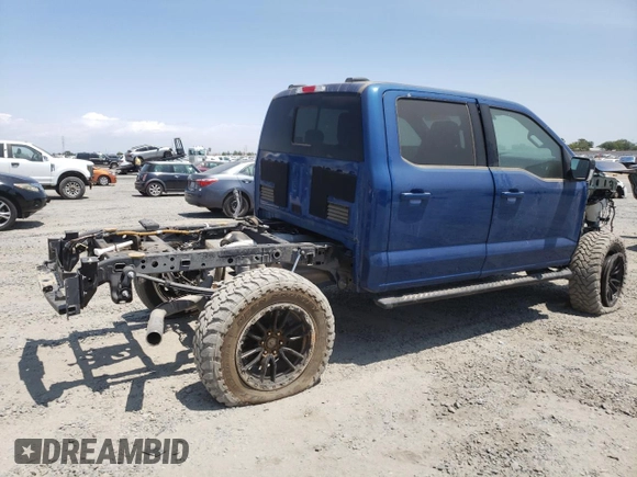 2023 Ford F-150 XL with VIN 1FTFW1E8XPKE23518, listed as a Copart auction lot 60340975 with 11,661 mi miles and Salvage title. Bid and sale history available at DreamBid. Image 3.