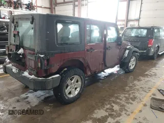 2009 Jeep Wrangler Unlimited X with VIN 1J4GZ39159L718649, listed as a IAAI auction lot 41395033 with 289,574 mi miles. Bid and sale history available at carsss.com. Image 4.