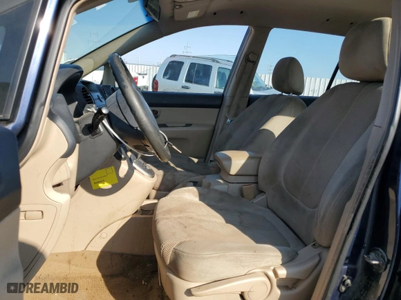 2007 Kia Rondo EX with VIN KNAFG526977061088, listed as a Copart auction lot 71687844 with 186,379 mi miles and Salvage Title. Bid and sale history available at carsss.com. Image 7.