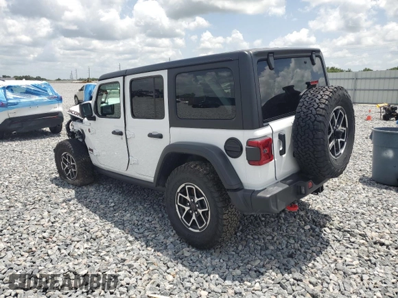 2024 Jeep Wrangler Rubicon z VIN 1C4PJXFG9RW336006, wystawiony jako Copart lot #60237785 z przebiegiem 24 571 mil mil oraz Czysty tytuł • Clean title. Historia ofert i sprzedaży dostępna na DreamBid. Obrazek 2.