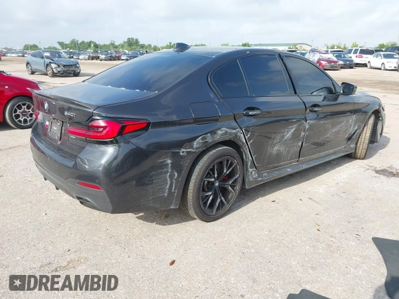2021 BMW 5 Series 540i with VIN WBA53BJ03MCG98664, listed as a IAAI auction lot 42488708 with 64,101 mi miles and . Bid and sale history available at DreamBid. Image 4.
