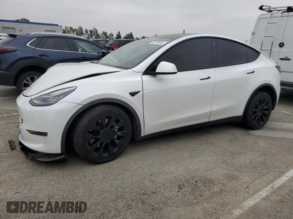 2021 Tesla Model Y Long Range with VIN 5YJYGDEE3MF214823, listed as a Copart auction lot 50738045 with 63,227 mi miles and Salvage Title. Bid and sale history available at DreamBid. Image 1.