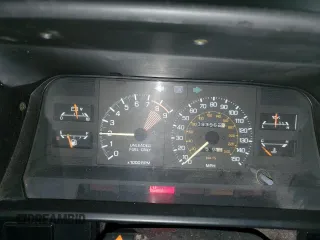 1989 Toyota MR2 z VIN JT2AW15C1K0150268, wystawiony jako Copart lot #86257134 z przebiegiem 93 969 mil mil oraz Tytuł czysty. Historia ofert i sprzedaży dostępna na DreamBid. Obrazek 9.