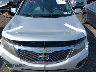 2011 Kia Sorento LX with VIN 5XYKTCA12BG014522, listed as a IAAI auction lot 42115390 with 116,515 mi miles. Bid and sale history available at carsss.com. Image 6.