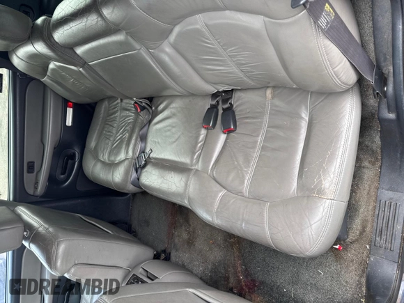 2002 Chevrolet Tahoe LS z VIN 1GNEC13Z92R180341, wystawiony jako Copart lot #59126715 z przebiegiem Nie podano mil oraz Czysty tytuł • Clean title. Historia ofert i sprzedaży dostępna na DreamBid. Obrazek 6.