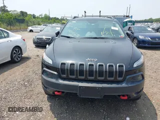 2014 Jeep Cherokee Trailhawk with VIN 1C4PJMBS8EW285276, listed as a IAAI auction lot 42408796 with Not provided miles and . Bid and sale history available at DreamBid. Image 11.