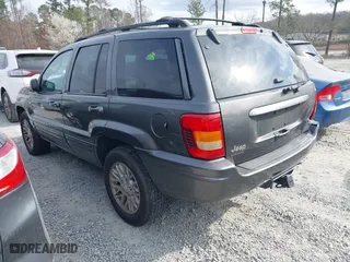 2004 Jeep Grand Cherokee Limited with VIN 1J8GW58N14C391912, listed as a IAAI auction lot 41706729 with 248,806 mi miles. Bid and sale history available at carsss.com. Image 3.