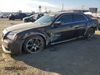 2013 Chrysler 300 SRT-8 with VIN 2C3CCAFJ8DH646483, listed as a Copart auction lot 83261144 with 86,015 mi miles and Salvage Title. Bid and sale history available at carsss.com. Image 1.
