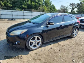 2014 Ford Focus Titanium with VIN 1FADP3N21EL274263, listed as a Copart auction lot 64017905 with 211,775 mi miles and Clean title. Bid and sale history available at DreamBid. Image 1.