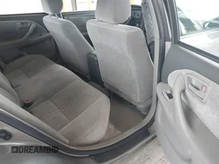 1998 Toyota Camry LE z VIN JT2BG22KXW0157647, wystawiony jako IAAI lot #42282818 z przebiegiem 267 681 mil mil oraz . Historia ofert i sprzedaży dostępna na DreamBid. Obrazek 8.