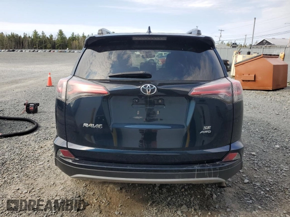 2017 Toyota RAV4 SE with VIN 2T3JFREVXHW618252, listed as a Copart auction lot 55743505 with 164,725 mi miles and Salvage title. Bid and sale history available at DreamBid. Image 6.
