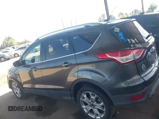 2015 Ford Escape Titanium with VIN 1FMCU0J92FUA20469, listed as a IAAI auction lot 42510293 with 161,466 mi miles and . Bid and sale history available at DreamBid. Image 15.