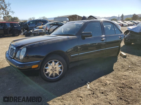 1998 Mercedes-Benz E 320 with VIN WDBJF65F8WA591263, listed as a Copart auction lot 77790804 with 204,821 mi miles and Non Repairable. Bid and sale history available at DreamBid. Image 1.