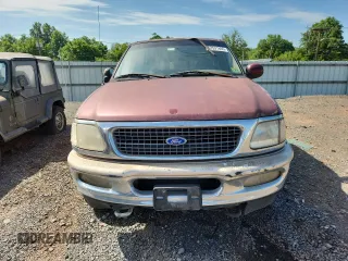 1997 Ford F-150 XL z VIN 1FTDX186XVKB29967, wystawiony jako Copart lot #63531805 z przebiegiem 178 616 mil mil oraz Czysty tytuł • Clean title. Historia ofert i sprzedaży dostępna na DreamBid. Obrazek 5.
