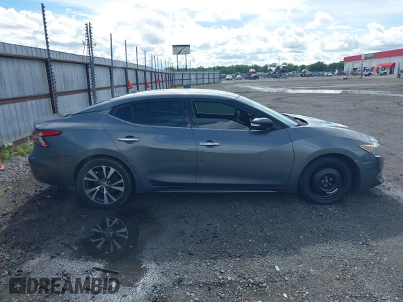 2017 Nissan Maxima SL z VIN 1N4AA6AP3HC441685, wystawiony jako IAAI lot #42236439 z przebiegiem 175 931 mil mil oraz . Historia ofert i sprzedaży dostępna na DreamBid. Obrazek 13.