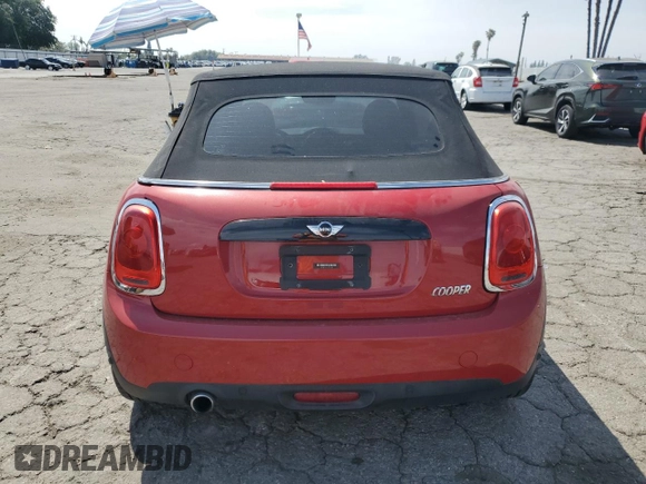 2016 MINI Convertible с VIN WMWWG5C54G3C19062, выставлен на аукционе Copart как лот 53077555 с пробегом 66 686 миль миль и Списание • Salvage title. История ставок и продаж доступна на DreamBid. Изображение 6.