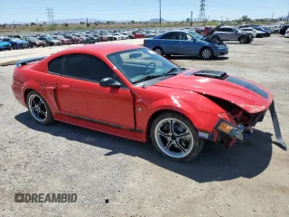 2003 Ford Mustang Premium Mach 1 with VIN 1FAFP42RX3F397779, listed as a Copart auction lot 61989145 with 99,824 mi miles and Salvage title. Bid and sale history available at DreamBid. Image 4.