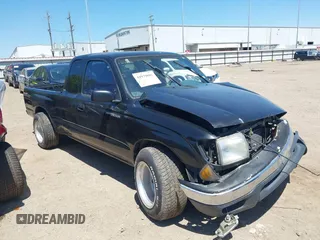 1999 Toyota Tacoma with VIN 4TAVL52N1XZ410651, listed as a IAAI auction lot 41979685 with 207,936 mi miles and . Bid and sale history available at DreamBid. Image 1.