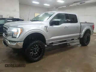 2021 Ford F-150 XL with VIN 1FTFW1E50MFA23431, listed as a Copart auction lot 51638895 with 51,473 mi miles and Salvage title. Bid and sale history available at DreamBid. Image 1.