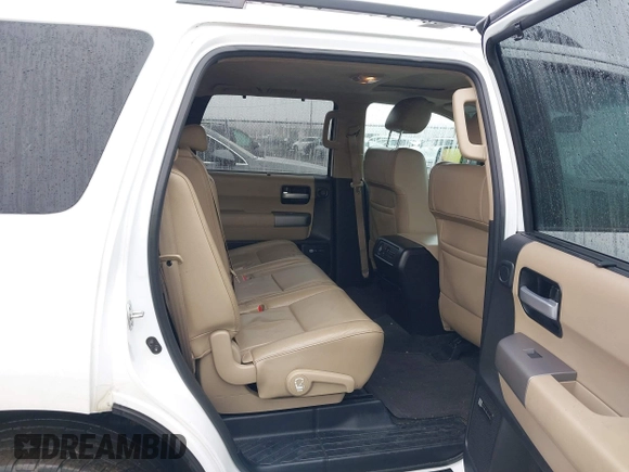 2016 Toyota Sequoia Limited with VIN 5TDJY5G18GS140071, listed as a IAAI auction lot 41570590 with 76,774 mi miles. Bid and sale history available at carsss.com. Image 8.