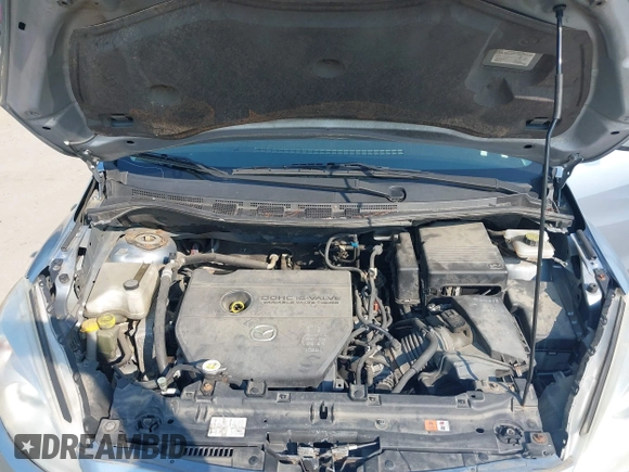 2012 Mazda 5 Sport with VIN JM1CW2BL5C0109542, listed as a IAAI auction lot 42494218 with 248,428 mi miles and . Bid and sale history available at DreamBid. Image 10.