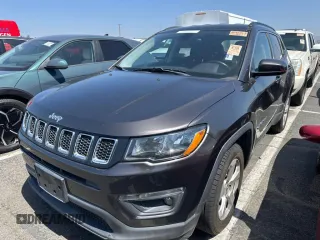 2018 Jeep Compass Latitude with VIN 3C4NJCBB8JT318665, listed as a Copart auction lot 65582285 with 106,550 mi miles and Clean title. Bid and sale history available at DreamBid. Image 1.