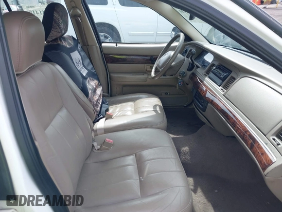 2004 Mercury Grand Marquis LS Premium z VIN 2MEFM75W04X678032, wystawiony jako IAAI lot #42341419 z przebiegiem 114 502 mil mil oraz . Historia ofert i sprzedaży dostępna na DreamBid. Obrazek 5.