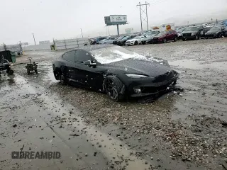 2021 Tesla Model S Long Range Plus z VIN 5YJSA1E2XMF427618, wystawiony jako Copart lot #41654955 z przebiegiem Nie podano mil oraz Szkoda całkowita • Salvage title. Historia ofert i sprzedaży dostępna na DreamBid. Obrazek 11.