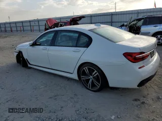 2018 BMW 7 Series 740i with VIN WBA7E2C55JG742869, listed as a Copart auction lot 52317095 with 0 mi miles and Salvage Title. Bid and sale history available at carsss.com. Image 2.