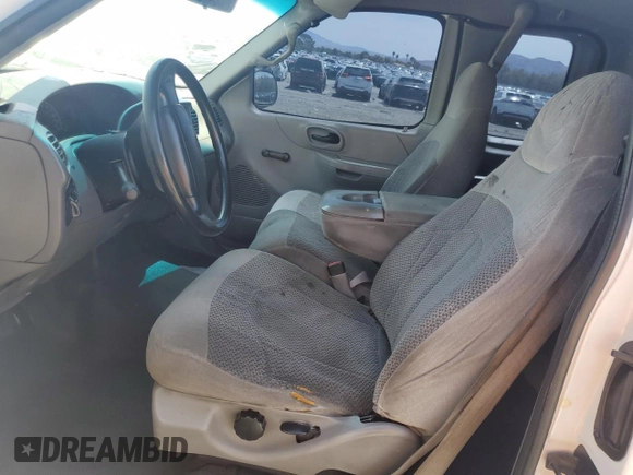 1999 Ford F-150 XL with VIN 1FTZX0726XKA98752, listed as a Copart auction lot 58986695 with Not provided miles and Salvage title. Bid and sale history available at DreamBid. Image 7.
