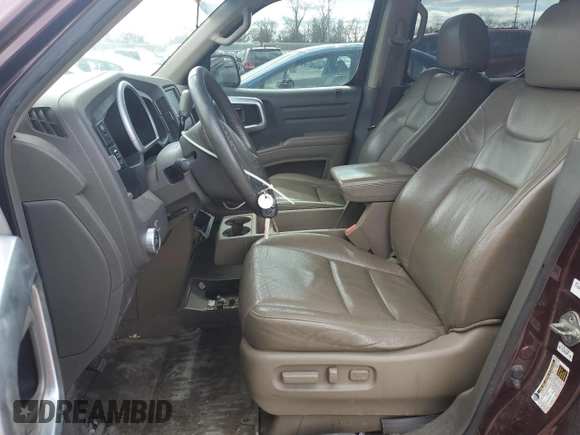 2007 Honda Ridgeline RTL z VIN 2HJYK16547H527465, wystawiony jako Copart lot #47943765 z przebiegiem 205 927 mil mil oraz Tytuł czysty. Historia ofert i sprzedaży dostępna na DreamBid. Obrazek 7.