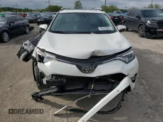 2016 Toyota RAV4 Limited with VIN 2T3DFREVXGW495077, listed as a Copart auction lot 55533505 with 122,483 mi miles and Salvage title. Bid and sale history available at DreamBid. Image 5.
