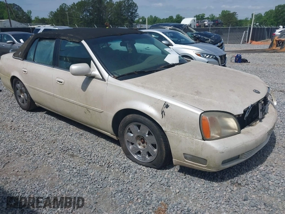 2000 Cadillac DeVille DTS z VIN 1G6KF5792YU216318, wystawiony jako IAAI lot #42134531 z przebiegiem 167 518 mil mil oraz . Historia ofert i sprzedaży dostępna na DreamBid. Obrazek 1.