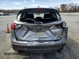 2014 Mazda CX-5 Touring with VIN JM3KE4CY1E0365787, listed as a Copart auction lot 49103355 with 144,031 mi miles and Salvage Title. Bid and sale history available at carsss.com. Image 6.