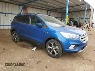 2017 Ford Escape SE with VIN 1FMCU9GD1HUC40205, listed as a Copart auction lot 54778475 with 54,297 mi miles and Clean Title. Bid and sale history available at carsss.com. Image 4.
