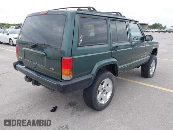1999 Jeep Cherokee Sport z VIN 1J4FT68S1XL667138, wystawiony jako IAAI lot #42651020 z przebiegiem 200 324 mil mil oraz . Historia ofert i sprzedaży dostępna na DreamBid. Obrazek 4.