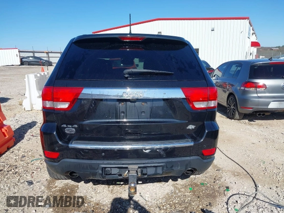 2013 Jeep Grand Cherokee Overland with VIN 1C4RJFCT1DC654653, listed as a IAAI auction lot 41826619 with 124,283 mi miles. Bid and sale history available at carsss.com. Image 17.