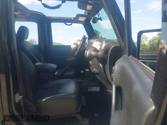 2016 Jeep Wrangler Unlimited Sahara with VIN 1C4BJWEG8GL253803, listed as a IAAI auction lot 42296118 with 163,463 mi miles and . Bid and sale history available at DreamBid. Image 5.