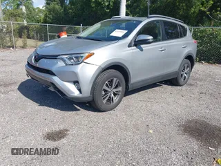 2018 Toyota RAV4 XLE with VIN JTMWFREV9JJ203353, listed as a IAAI auction lot 42129995 with 41,806 mi miles and . Bid and sale history available at DreamBid. Image 2.