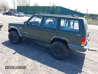 1998 Jeep Cherokee Sport with VIN 1J4FJ68S9WL189992, listed as a IAAI auction lot 42039822 with 156,006 mi miles. Bid and sale history available at carsss.com. Image 3.