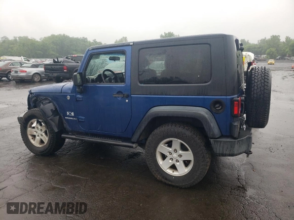 2009 Jeep Wrangler X with VIN 1J4FA24109L712701, listed as a Copart auction lot 60800855 with 156,709 mi miles and Salvage title. Bid and sale history available at DreamBid. Image 2.