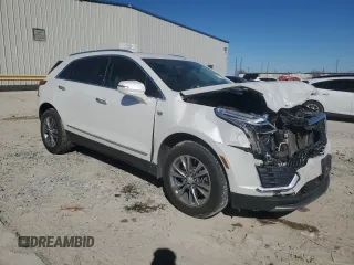 2021 Cadillac XT5 FWD Premium Luxury with VIN 1GYKNCRSXMZ135949, listed as a Copart auction lot 47752805 with 99,838 mi miles and Salvage Title. Bid and sale history available at carsss.com. Image 4.