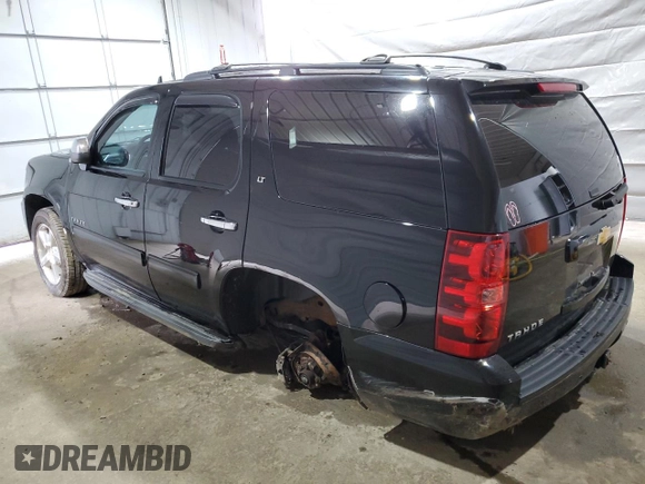 2013 Chevrolet Tahoe LT with VIN 1GNSKBE07DR174163, listed as a Copart auction lot 55501635 with 183,829 mi miles and Salvage title. Bid and sale history available at DreamBid. Image 2.