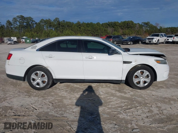 2014 Ford Police Interceptor z VIN 1FAHP2MK2EG125804, wystawiony jako IAAI lot #41297103 z przebiegiem 99 340 mil mil oraz . Historia ofert i sprzedaży dostępna na DreamBid. Obrazek 13.