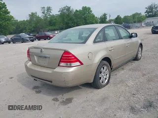 2005 Mercury Montego Luxury z VIN 1MEFM40125G612342, wystawiony jako IAAI lot #42393622 z przebiegiem 248 945 mil mil oraz . Historia ofert i sprzedaży dostępna na DreamBid. Obrazek 4.