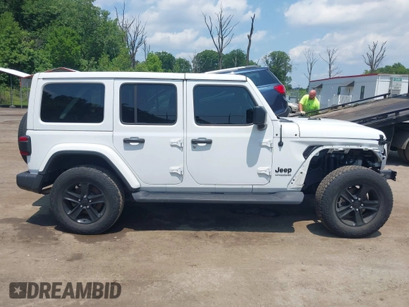 2021 Jeep Wrangler Unlimited Sahara with VIN 1C4HJXEN1MW618508, listed as a IAAI auction lot 42639515 with 39,747 mi miles and . Bid and sale history available at DreamBid. Image 13.