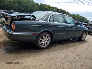2004 Jaguar XJ with VIN SAJWA71C34SG16508, listed as a Copart auction lot 66751644 with 179,039 mi miles and Salvage Title. Bid and sale history available at carsss.com. Image 3.